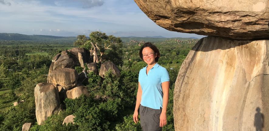 Trisna Tungadi on Kit Mikayi rock in Kenya when she worked with John Carr on a postdoctoral project in collaboration with bean growers in Kenya