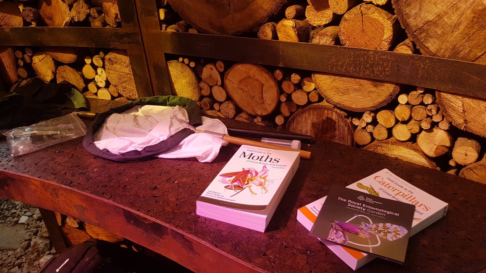 Books, microscopes and entomology gear at the RES Garden