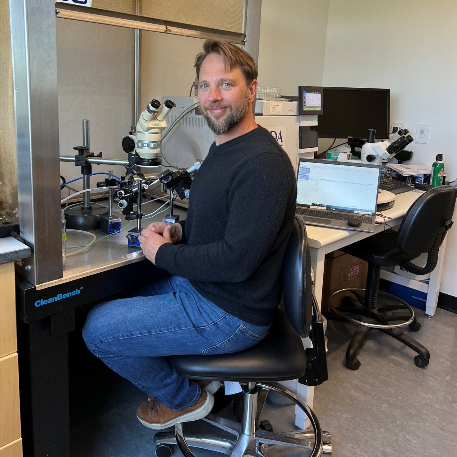 Meet the Editor - Chris Ranger seated at a desk