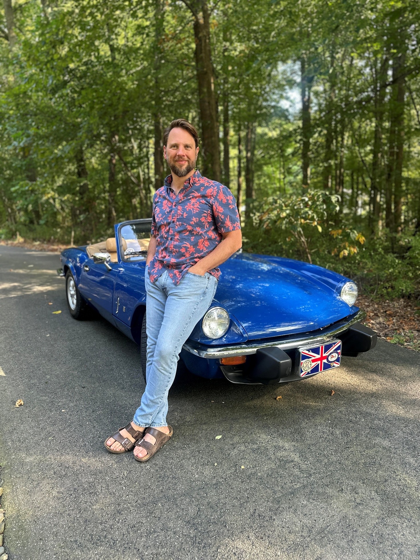 Meet the Editor - Chris Ranger standing in front of a car