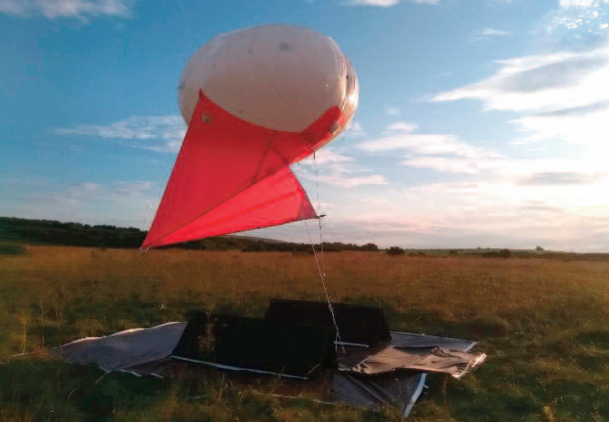 Figure 4. A Helikite, a helium-filled balloon, attached to an entomological net. These kites can be used to sample the aerial insect fauna. Credit: F. Addison.
